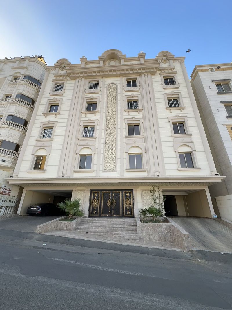 The second building, two minutes away